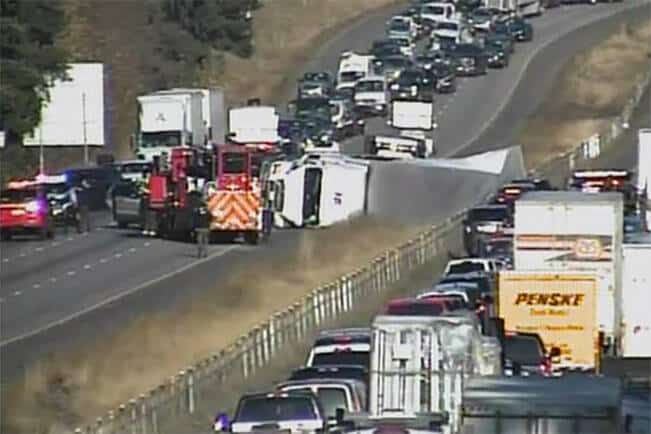 Emergency services and Washington State Department of Transportation crews on scene on the I-5 in <a class=