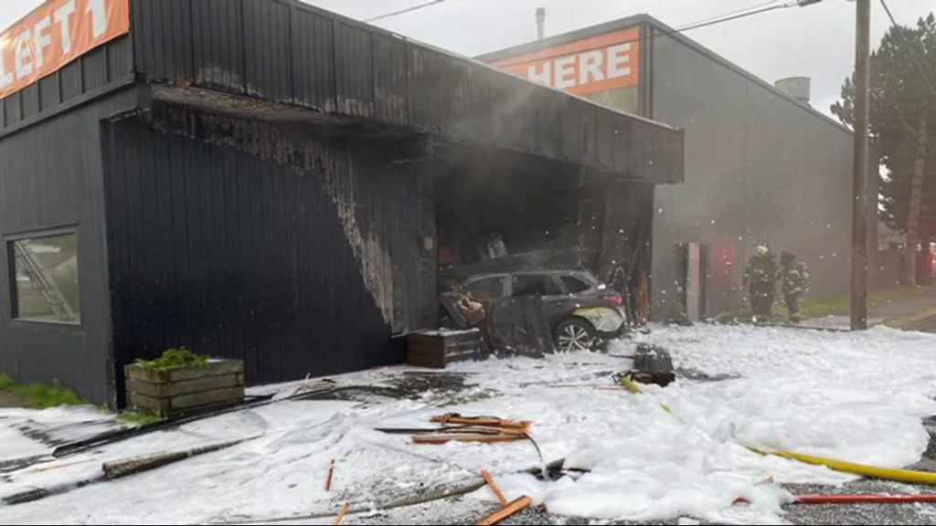 Car crashes into Georgetown building, ignites fire