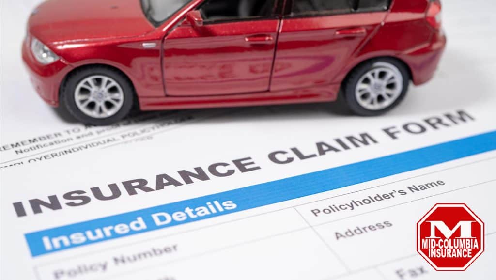 Red car on Insurance claim accident car form