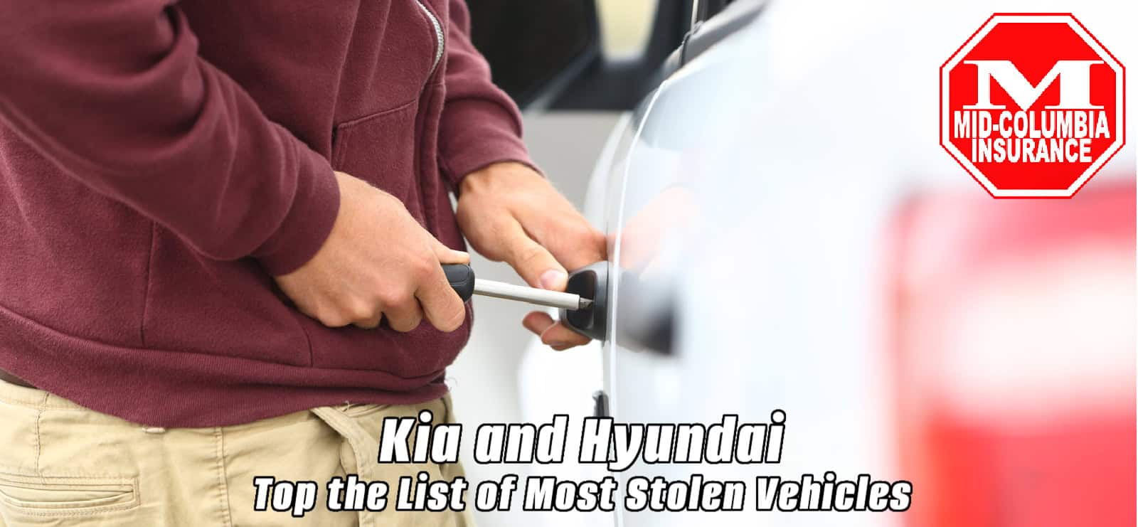 Kia And Hyundai Top The List Of Most Stolen Vehicles - man committting a car break in and theft with a screw driver inserted into the lock