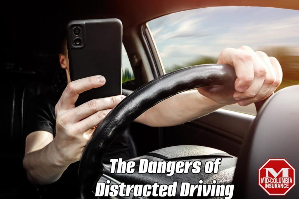 The Driver At The Wheel Of A Car Uses A Smartphone, Distracted From The Road.