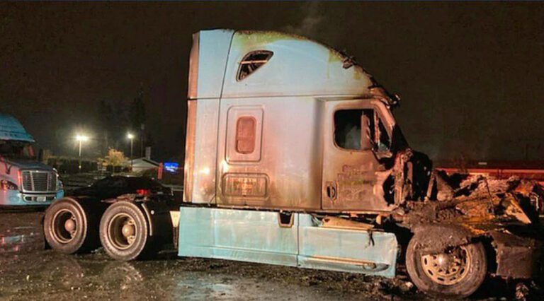 Washington state authorities working to ID body found in burned-out semi